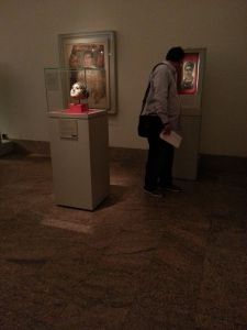 Viewer in the “Gallery of Egypt Under Roman Rule 30 B.C. to 400 A.D.” at The Metropolitan Museum of Art.  Photo © Deborah Feller.